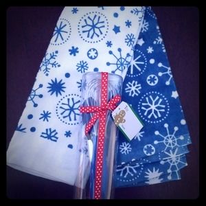 Blue snowflake towels and kitchen utensils